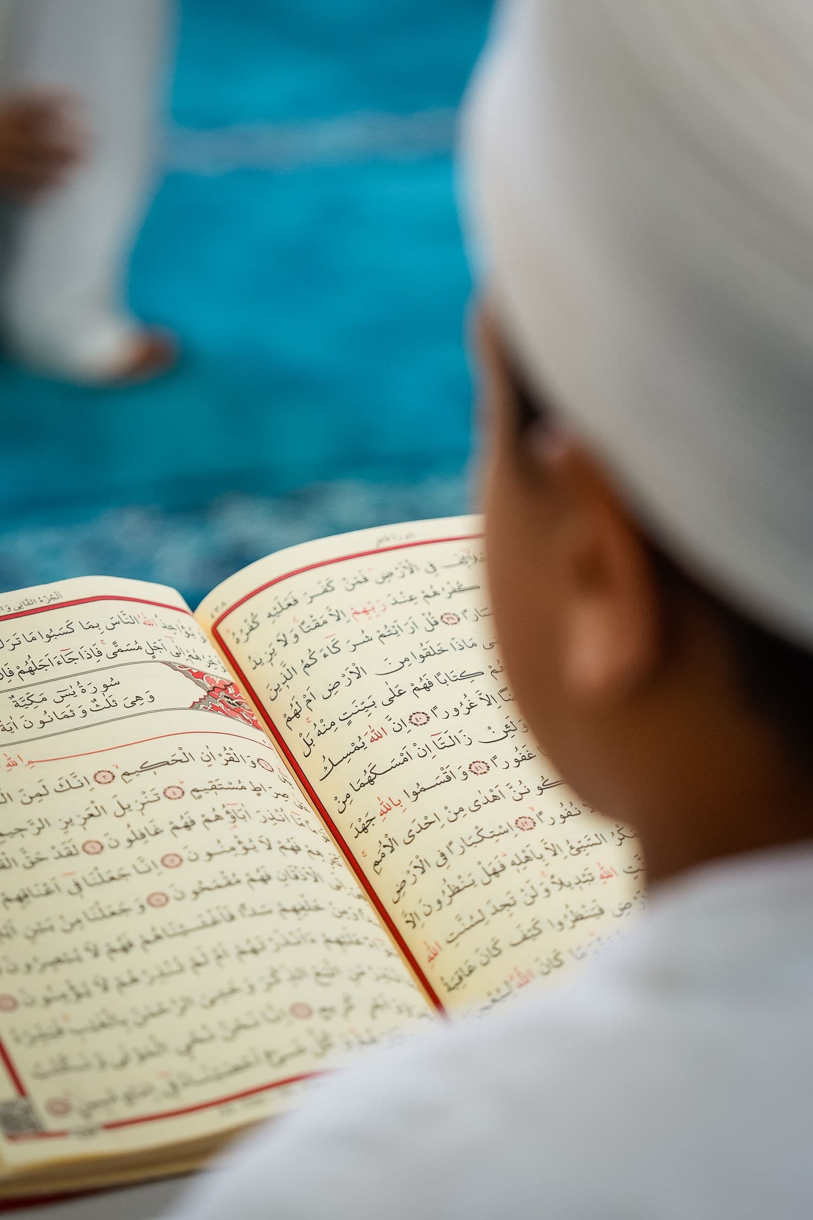Child reading the Quran
